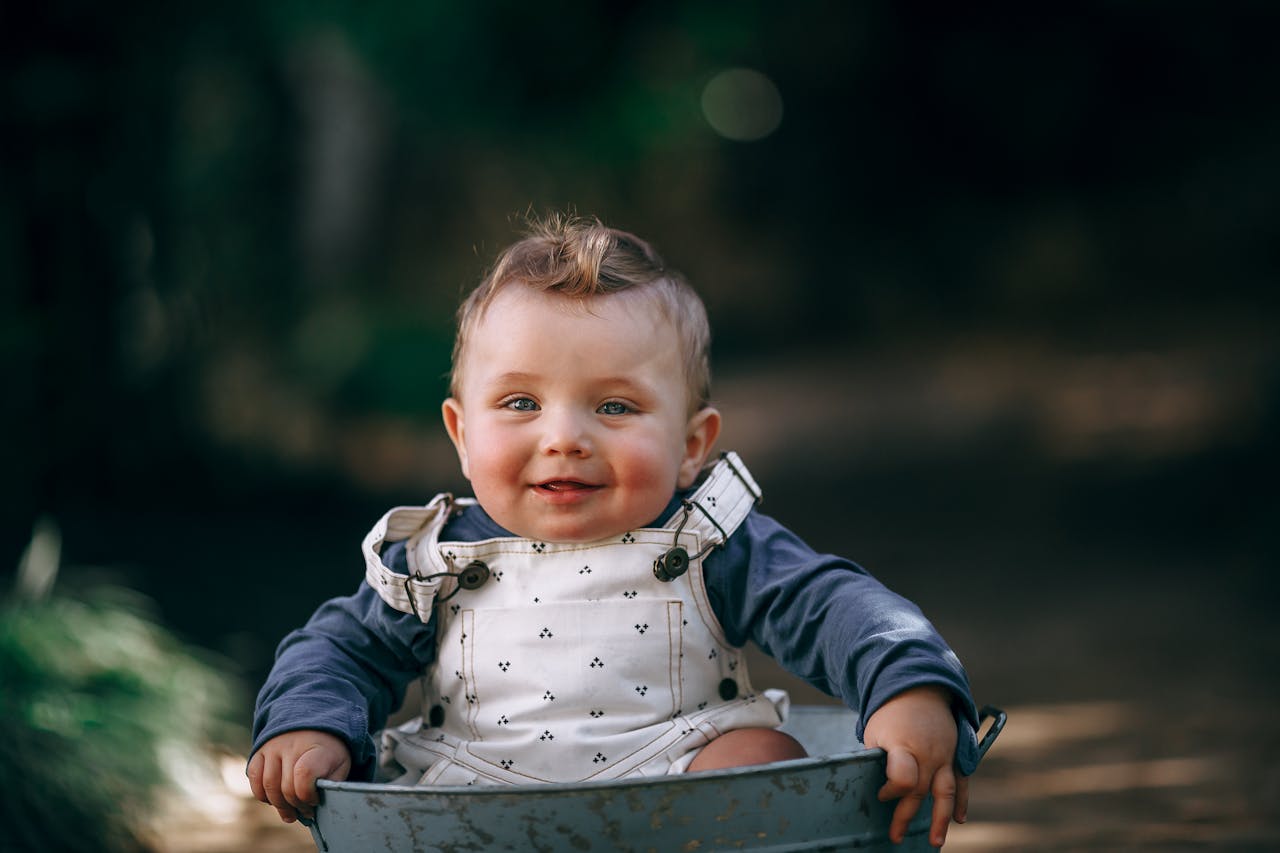 Child smiling near the water