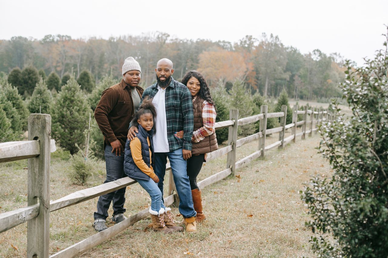 Family walking through a field