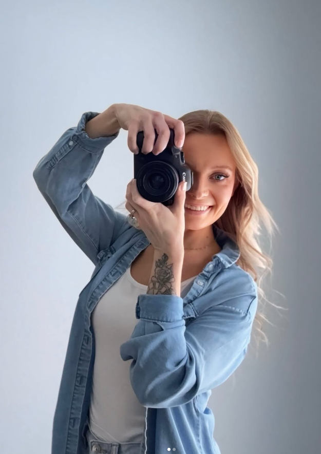 Natasha Jo holding camera